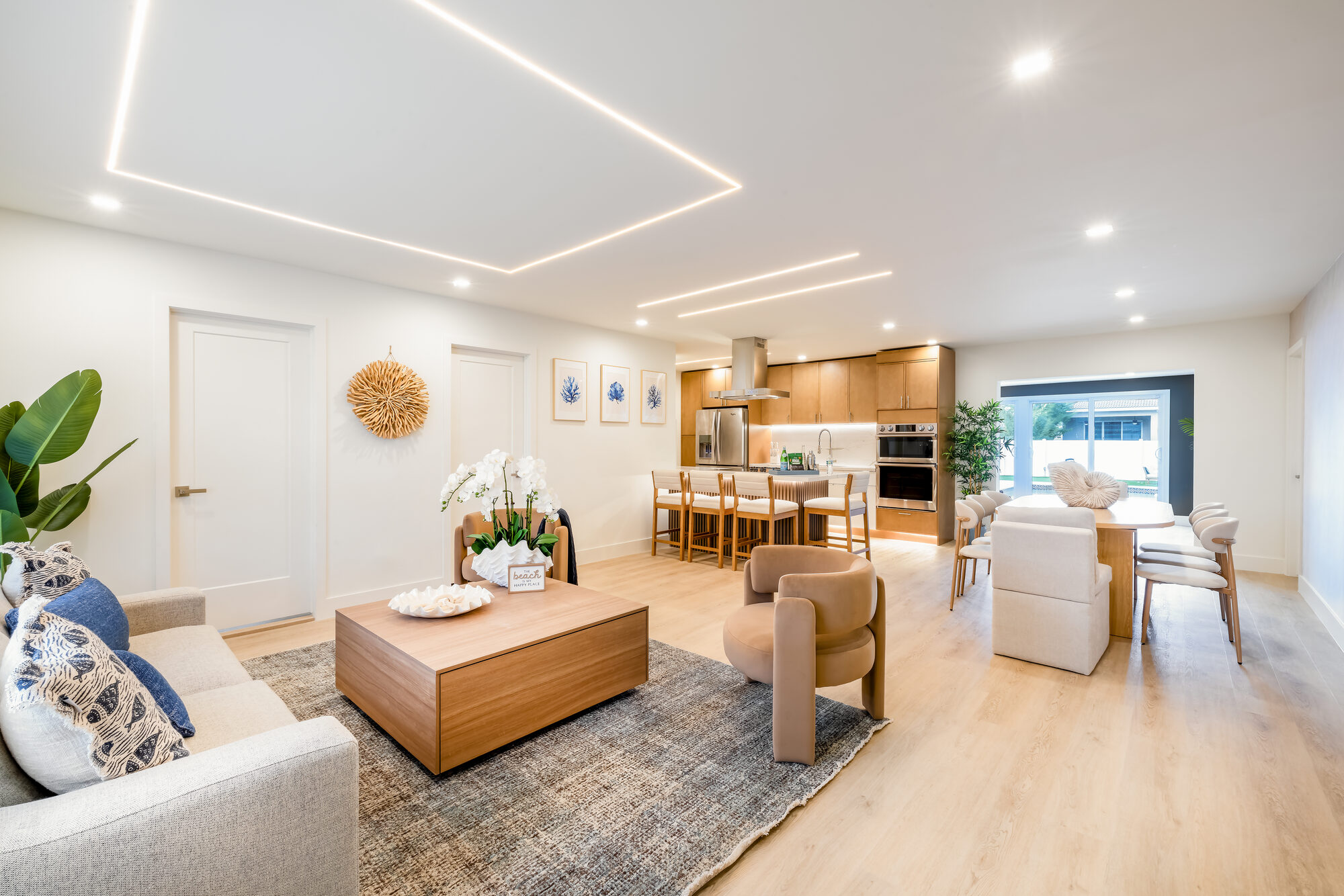 A warm South Florida home staged by HAUS by WOW